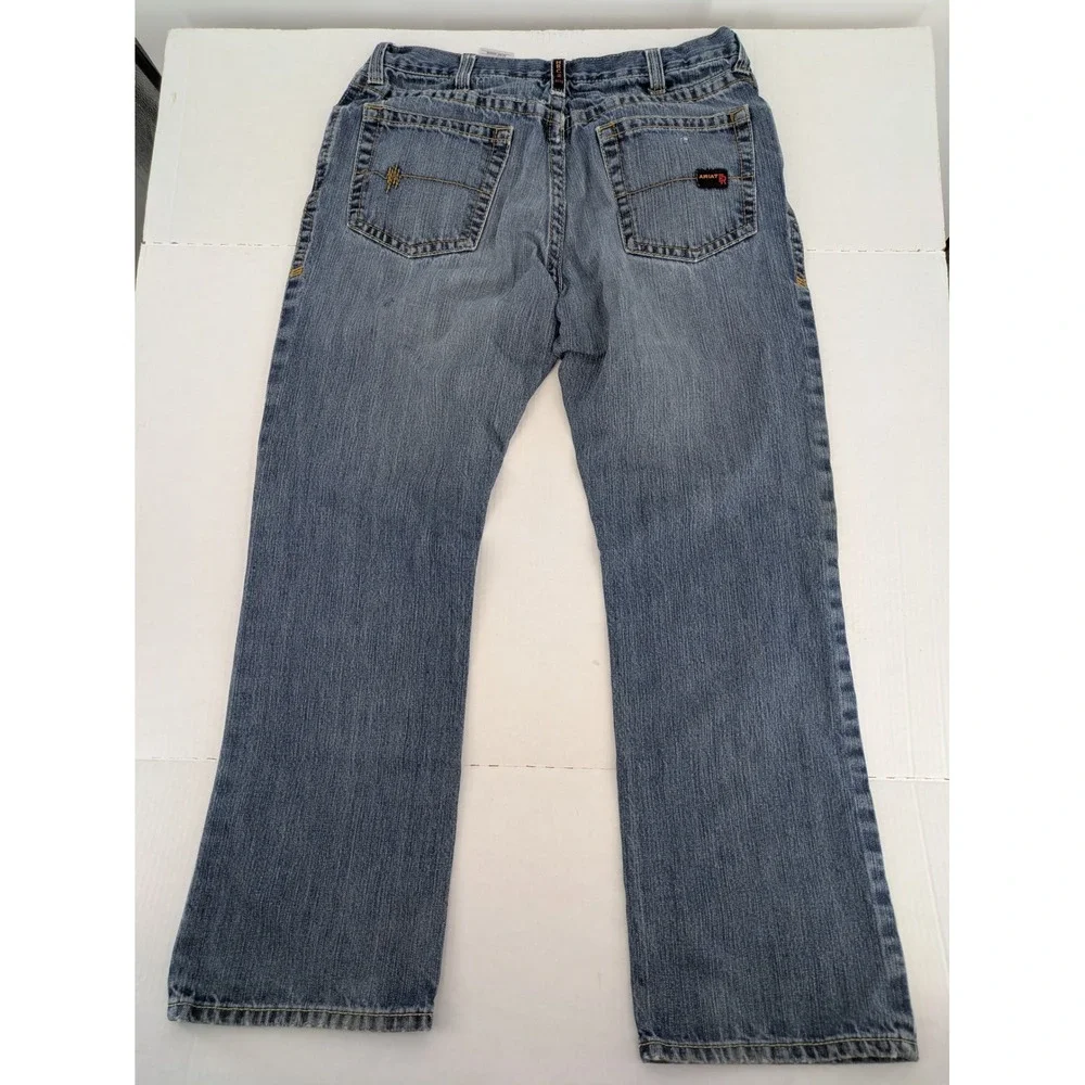 Ariat FR M4 Low Rise Boot Cut Jeans Mens 35x32 Blue Distressed Thrashed Workwear
